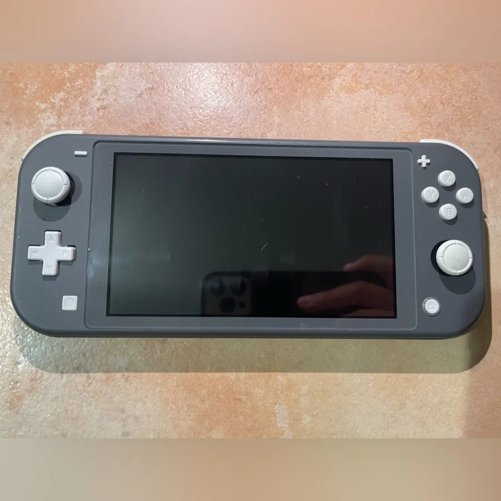 Nintendo Switch Lite Gray - Portable with 3 games + Charger Included